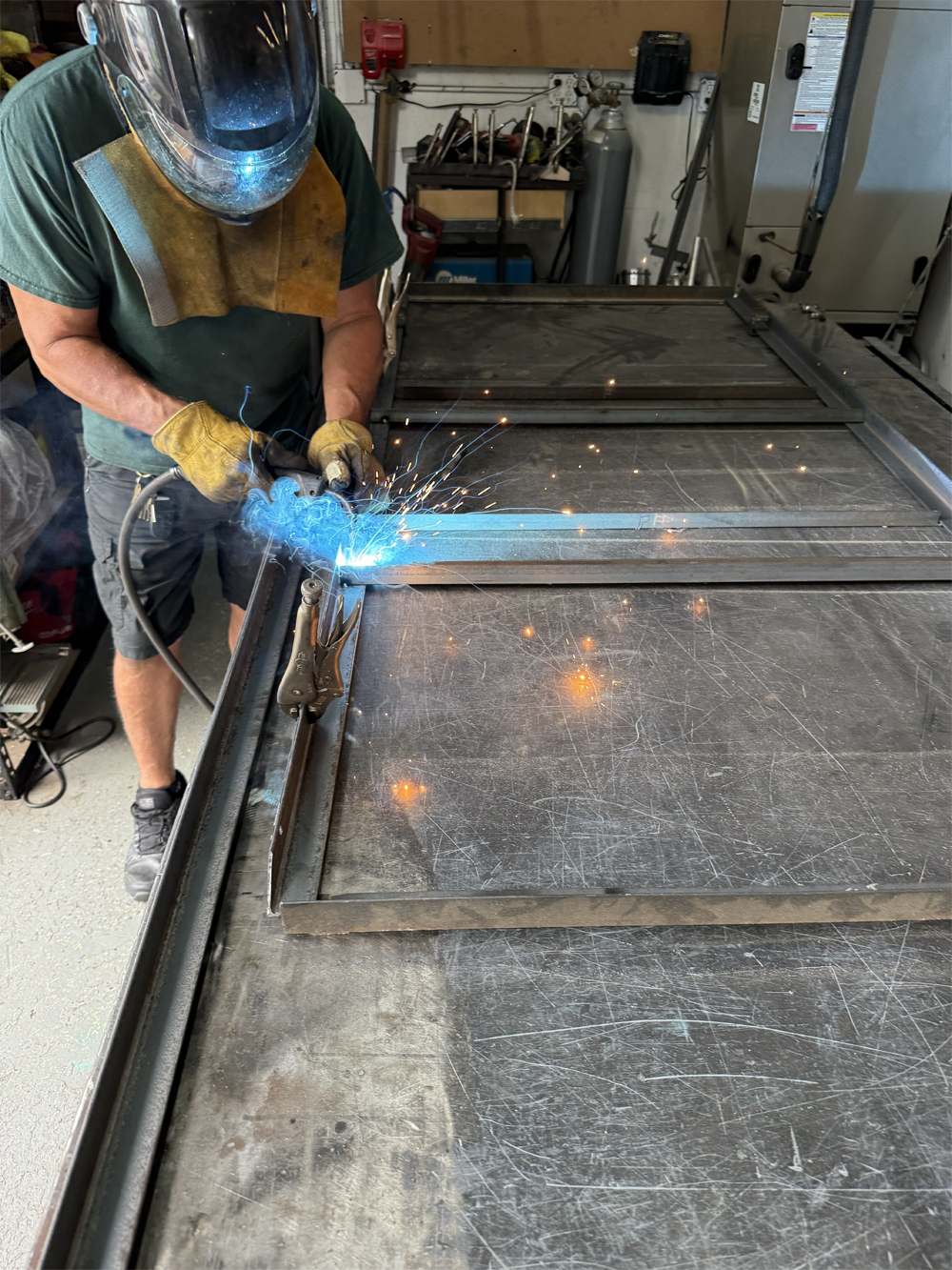 Murphy bed mechanism being welded in-house in Hollywood Florida