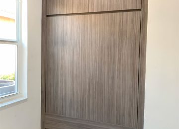 Custom Murphy bed for small spaces in modern condo bedroom